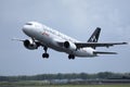 Austrian Airlines Star Alliance plane landing in airport Royalty Free Stock Photo