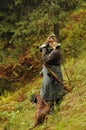 Austrian Alps: Woman headhunter with her dog