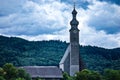 Austrian church standing strong against the incoming storm Royalty Free Stock Photo