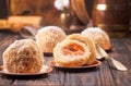 Austrian and czech sweet dessert knedle apricot dumplings on wooden background. Filled cottage cheese dough