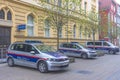 Austrian federal police cars parked on the street in front of the police headquarters in the old city center of Graz, Austria