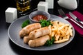 Austrian grilled sausages with french fries are a traditional snack Royalty Free Stock Photo