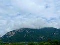 The Austrian mountains on the border with Germany. Clouds stretch across the mountain Royalty Free Stock Photo