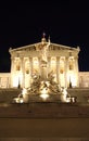 Austrian Parliament building in Vienna at night Royalty Free Stock Photo