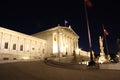 Austrian Parliament building in Vienna at night Royalty Free Stock Photo