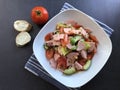 Austrian sausage salad `Wurstsalat` is a traditional snack and a light summer dish