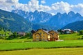 Austrian village among meadows fields and Alpine Royalty Free Stock Photo