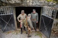 Austro-hungarian soldiers of the World War one on the entarance of the bunker, reenactment.