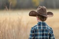 Authentic Back view cowboy boy costume. Generate Ai Royalty Free Stock Photo