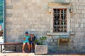 Authentic, brick wall with beautiful, old, wooden shutters, window