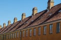 The authentic chimneys of the yellow houses of Nyboder in Copenhagen, Denmark Royalty Free Stock Photo