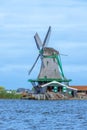 Authentic Dutch Windmill on the Canal Royalty Free Stock Photo