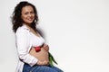 Authentic fashion portrait on white isolated background, attractive cheerful positive pregnant woman smiling at camera