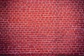 An authentic fragment of the red brick wall of the Moscow Kremlin in Russia. Brick red background for design. Royalty Free Stock Photo