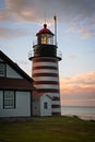 Authentic Fresnel Lens Shines Brightly During Sunset at West Quoddy Head Lighthouse in Maine