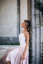 Authentic girl dancing on the street barefoot