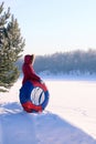 An authentic girl with an inflatable red and blue tube