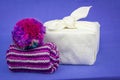 Authentic homemade knitted items with fabric wrapped gift. Make, bake, recycle and reuse for sustainable giving for holidays