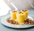 Authentic Indian cold drink made up of curd, milk malai called Lassi in saffron, kesar flavour, also called kesariya or keshariya