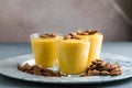 Authentic Indian cold drink made up of curd, milk malai called Lassi in saffron, kesar flavour, also called kesariya or keshariya Royalty Free Stock Photo