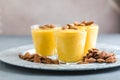 Authentic Indian cold drink made up of curd, milk malai called Lassi in saffron, kesar flavour, also called kesariya or keshariya Royalty Free Stock Photo