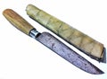 authentic Indonesian handmade knife with a sheath made from dried palm leaves