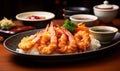 Authentic Japanese cuisine tempura shrimp with traditional sides and dipping sauce served on a ceramic plate Royalty Free Stock Photo