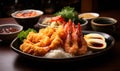 Authentic Japanese cuisine tempura shrimp with traditional sides and dipping sauce served on a ceramic plate Royalty Free Stock Photo