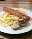 Authentic kielbasa Polish sausage with french fries