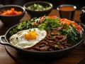 Authentic Korean Bibimbap Served in a Hot Stone Bowl with Vibrant Vegetables AI Generated