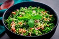 Authentic Lebanese Tabbouleh Garnished with Mint Leaves Royalty Free Stock Photo