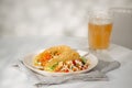 Authentic mexican tacos with beer. Mexican tacos with ground meat, beef, beans, onions and salsa Royalty Free Stock Photo