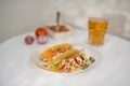 Authentic mexican tacos with beer. Mexican tacos with ground meat, beef, beans, onions and salsa Royalty Free Stock Photo