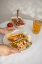 Authentic mexican tacos with beer. Mexican tacos with ground meat, beef, beans, onions and salsa Royalty Free Stock Photo