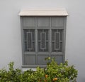 Authentic Moroccan architecture, carved wooden window in traditional riad. Marrakech, Morocco.