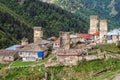 Authentic mountain georgian village with stone domestic buildings and ancient svan towers Royalty Free Stock Photo