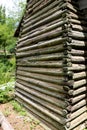 Authentic old log cabin wall with mud caulk Royalty Free Stock Photo