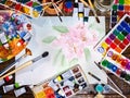 Authentic paint brushes still life on table in art class school. Royalty Free Stock Photo