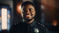 Authentic Portrait of Happy and Handsome Black Policeman in Universal Uniform Smiling at Camera Royalty Free Stock Photo