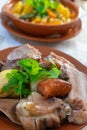 Authentic Portuguese cozido: a hearty stew with meats, vegetables, and spices.