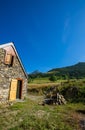 Authentic renovated Pyrenean barn in the Aure valley. slate roof, exposed stone and wood construction. amazing view on the