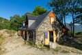 Authentic renovated Pyrenean barn in the Aure valley. slate roof, exposed stone and wood construction. amazing view on the