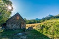 Authentic renovated Pyrenean barn in the Aure valley. slate roof, exposed stone and wood construction. amazing view on the