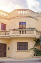 Authentic residential building with balconies in Malta