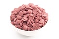Authentic Ruby Chocolate Drops on a White Background Royalty Free Stock Photo