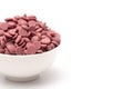 Authentic Ruby Chocolate Drops on a White Background Royalty Free Stock Photo