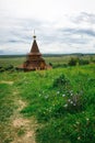 Authentic Russian wooden Church building on a high hill with panoramic views. Royalty Free Stock Photo