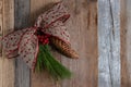 Authentic and rustic Christmas holiday decorations on weathered wood Royalty Free Stock Photo