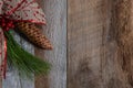 Authentic and rustic Christmas holiday decorations on weathered wood Royalty Free Stock Photo