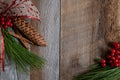 Authentic and rustic Christmas holiday decorations on weathered wood Royalty Free Stock Photo
